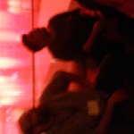 Crystal Williams & Matthew Shenoda in red lobby light